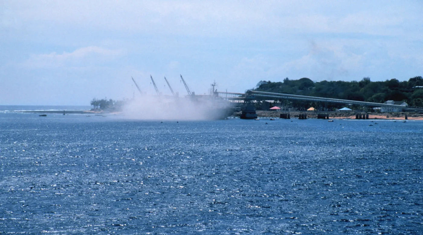 A bulk carrier loading phosphate at the cantilever piers off the coast of Nauru